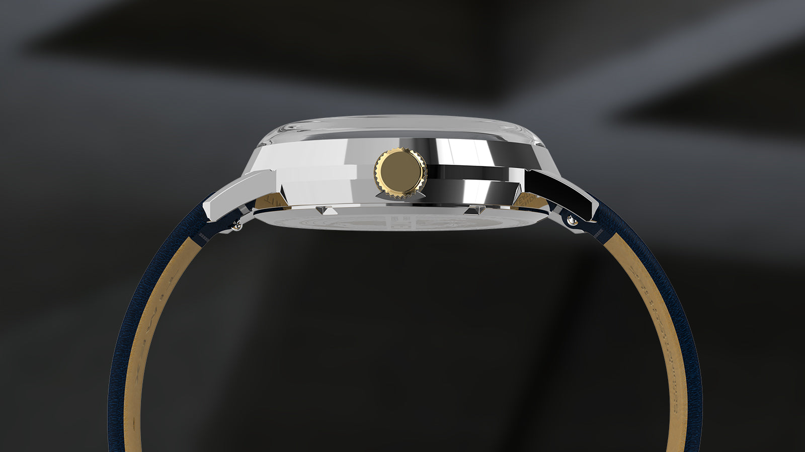 A side view showing the slim stainless steel case of the Timex Marlin® Quartz GMT. The crown is gold-tone, and the navy leather strap is visible beneath the polished lugs.