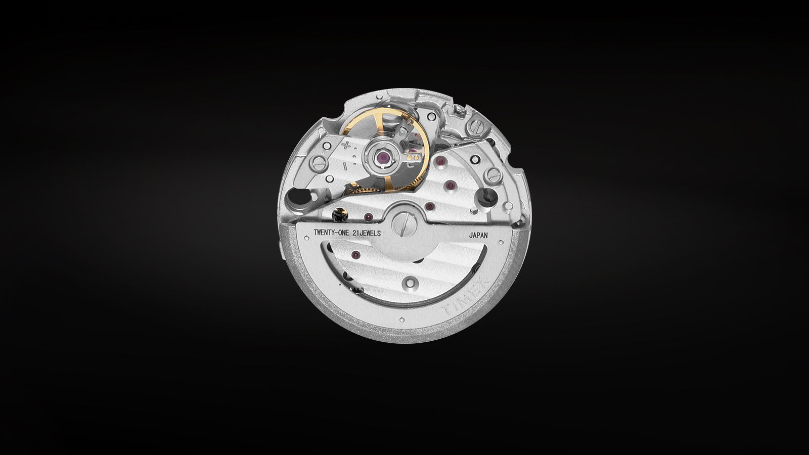 Mechanical movement of the Timex Deepwater Meridian 200 showing the 21-jewel automatic mechanism with engraved markings.