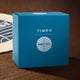 Blue Timex x Pan Am® Waterbury Ace Chronograph watch box featuring the Pan Am globe logo in white.