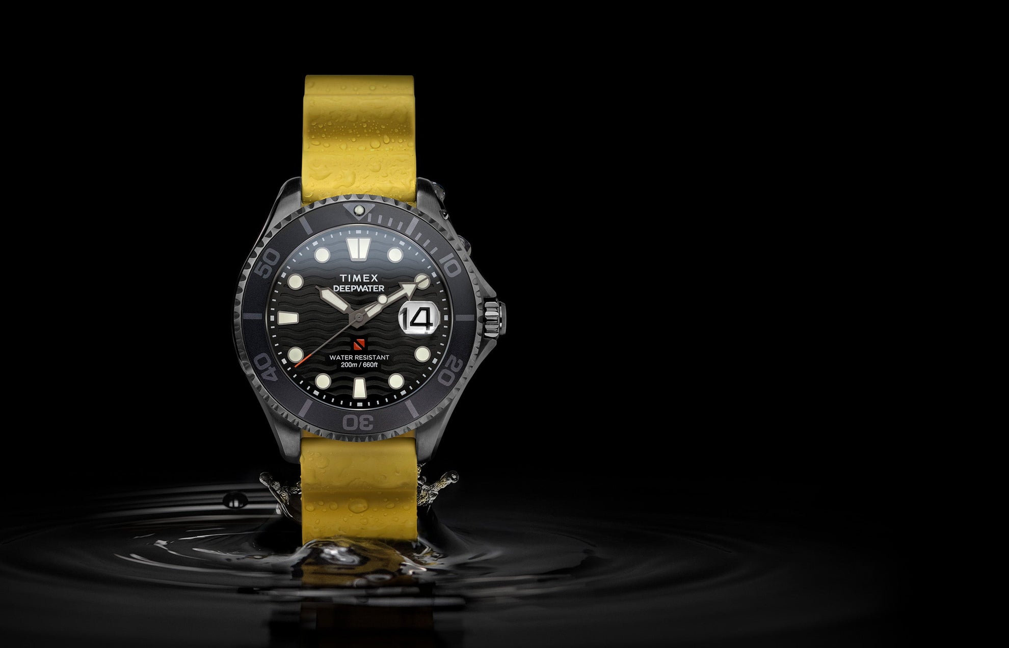 Timex Deepwater Meridian 200 dive watch with yellow silicone strap and black dial emerging from dark water, showcasing its 200-meter water resistance and wave-pattern texture.