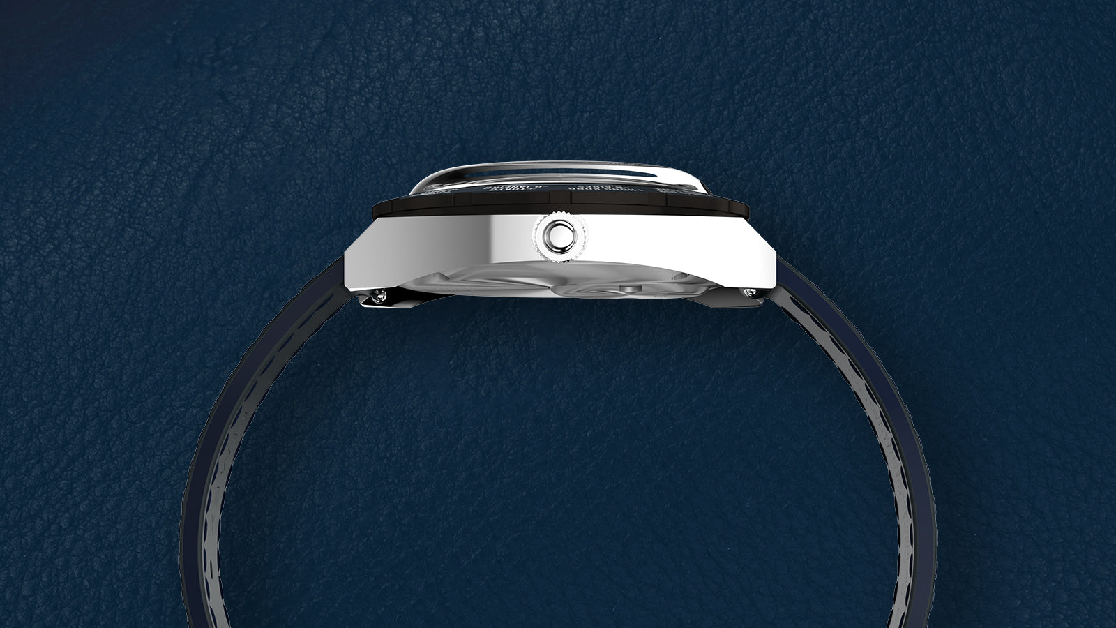 Side profile of the Q Timex® 1972 World Time showing the slim brushed steel case, domed crystal, and navy blue stitched leather strap.