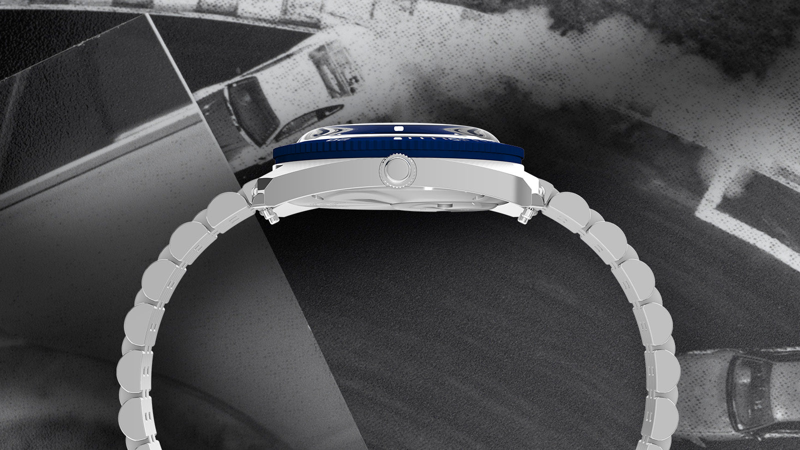 Side profile view of the Q Timex® 1971 Velocity watch showing the polished case, crown, and bracelet curvature against a blurred racing background.