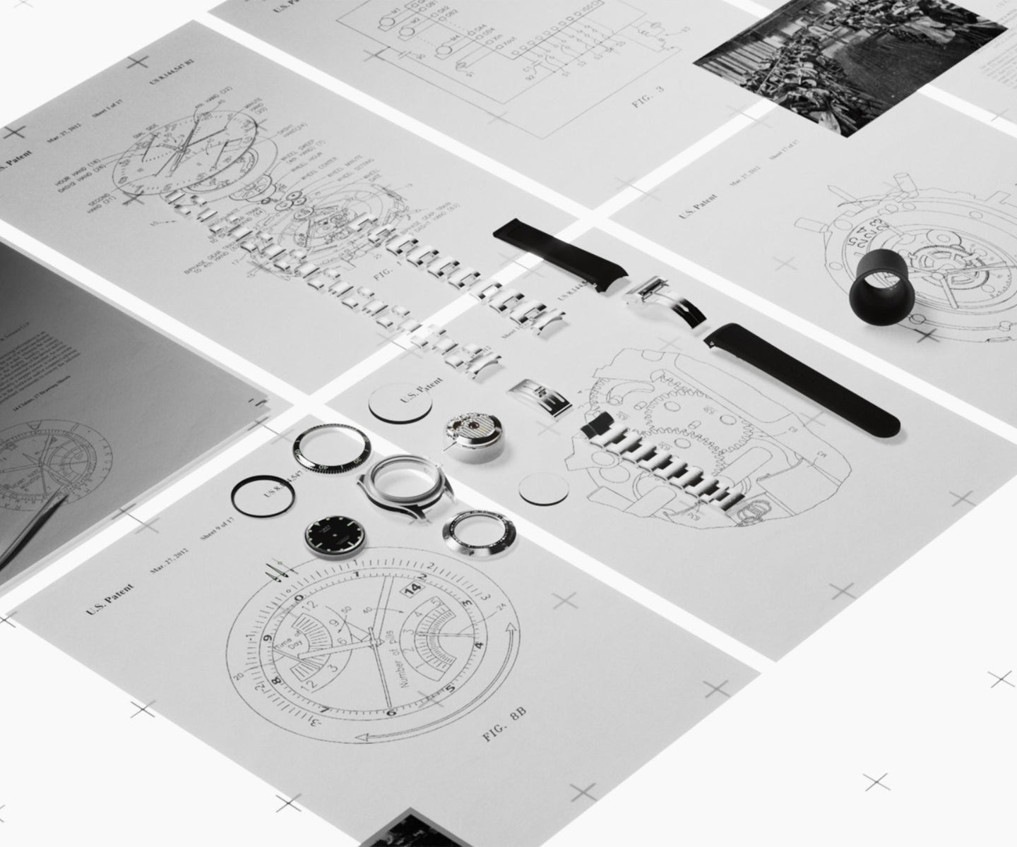 Flat lay of technical watchmaking blueprints and exploded diagrams of components, with Timex Atelier case parts, bezels, and movements displayed on top.
