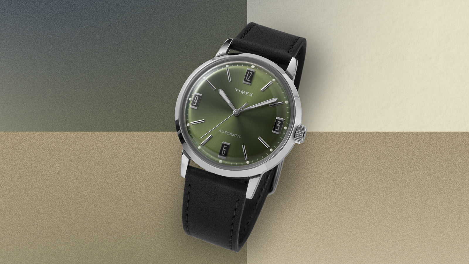 Timex Marlin Automatic featuring a green gradient dial with silver-tone markers and black leather strap.