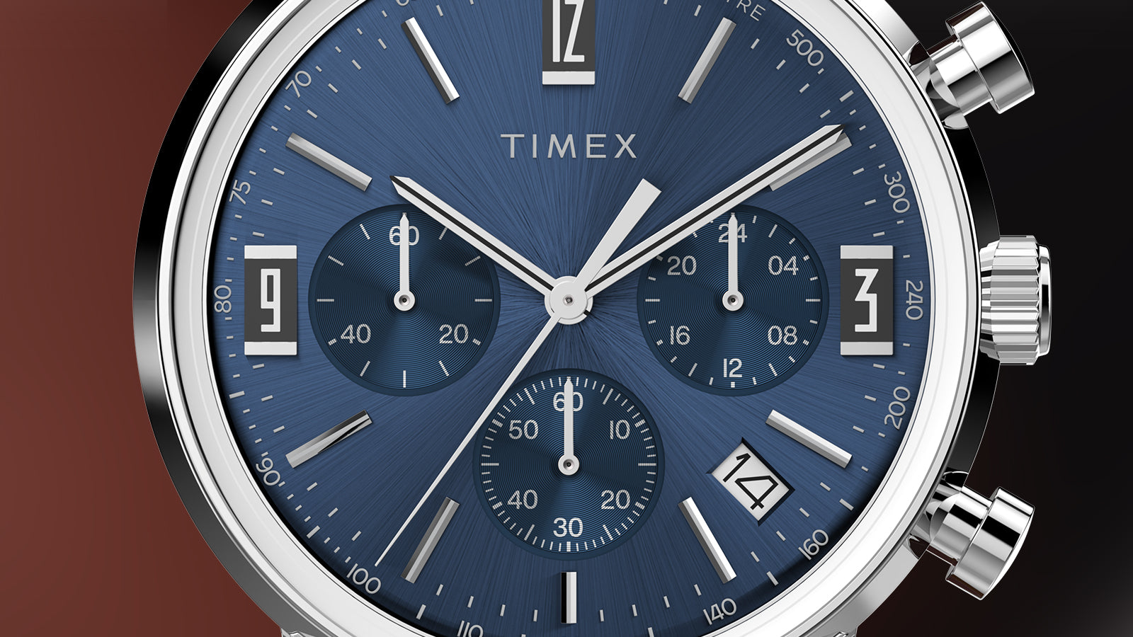 Close-up of Timex Marlin Chronograph Tachymeter blue dial featuring three subdials, tachymeter scale, and silver-tone hands.