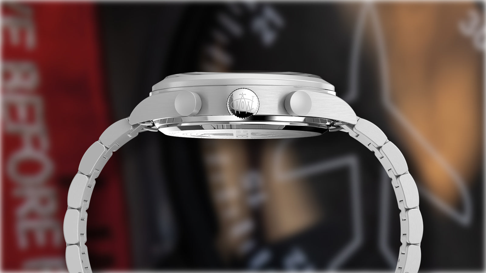 Side profile of the Timex Waterbury Traditional Fly-Back Chronograph highlighting brushed stainless steel case, signed crown, and pushers.