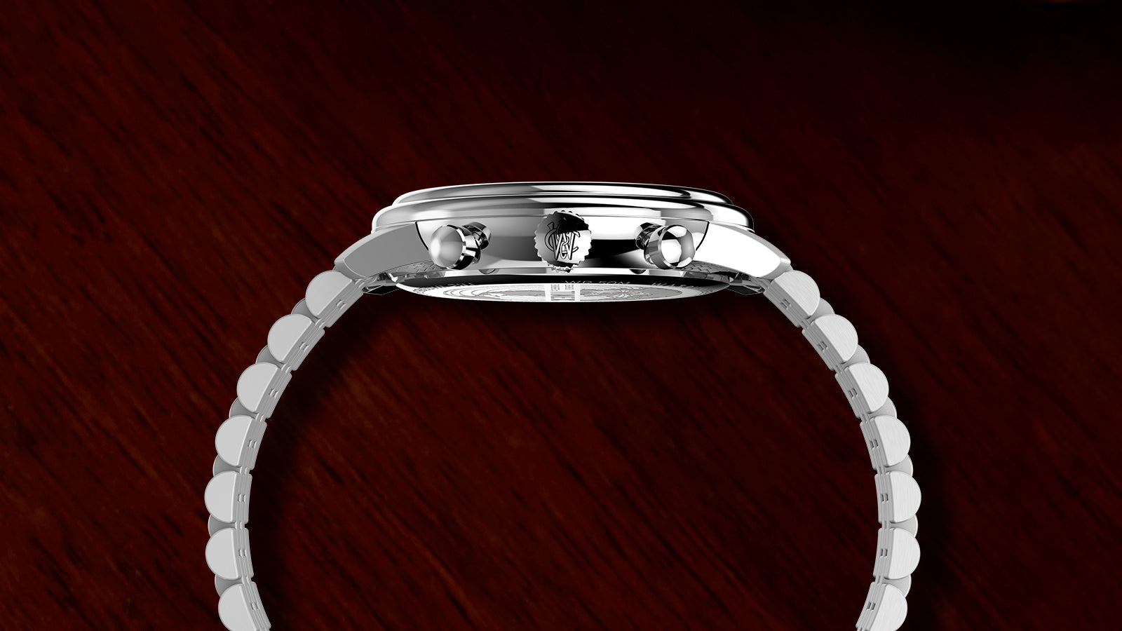 Side view of the Timex Waterbury Metropolitan Chronograph displaying slim polished case, crown, and chronograph pushers against a dark wood background.