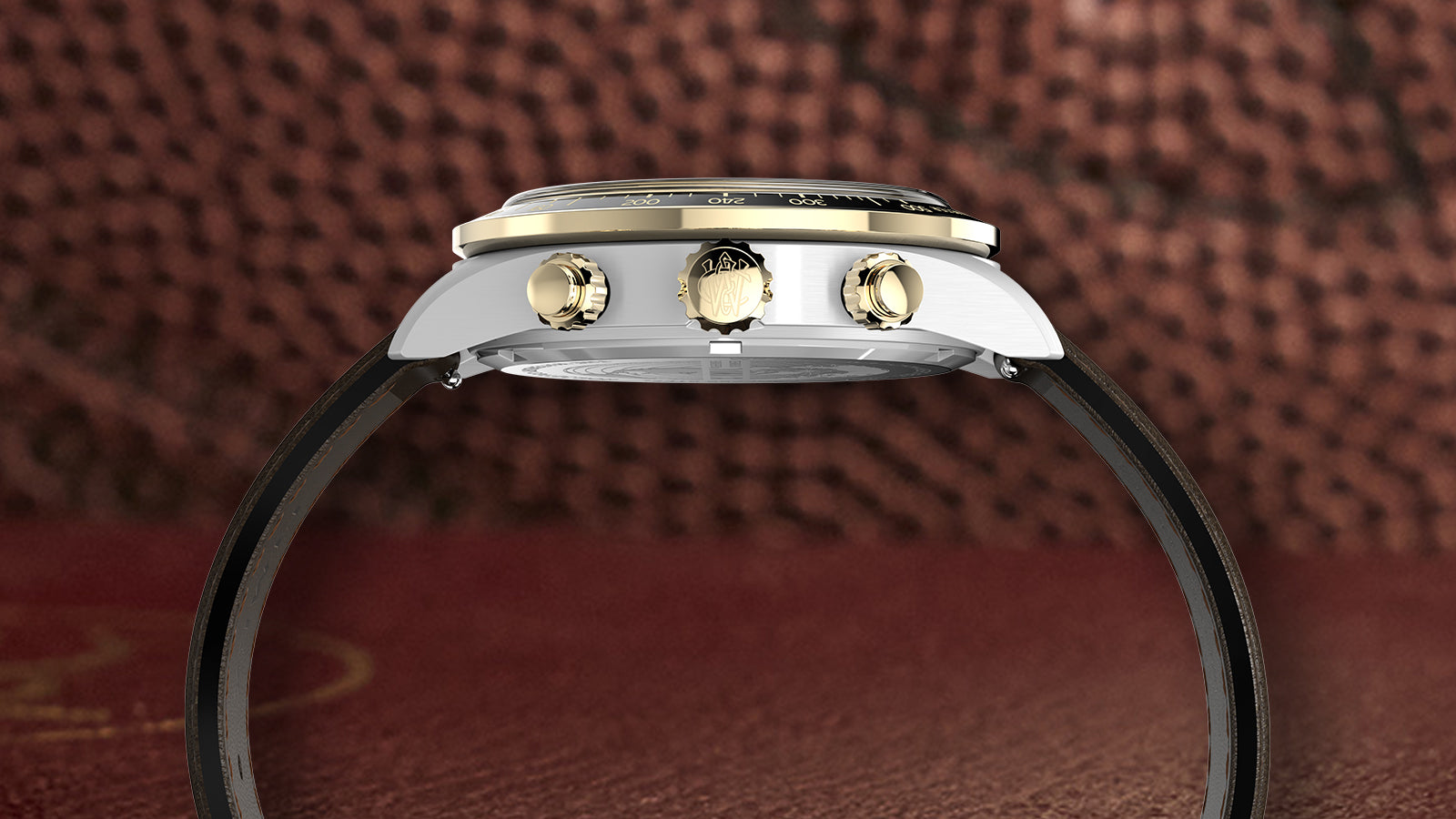 Side view of the Timex Waterbury Heritage Chronograph showing gold crown and pushers with black tachymeter bezel and brown leather strap.