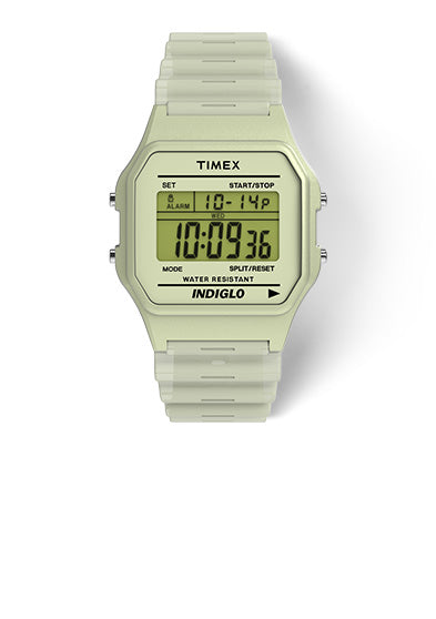 Front view of the TIMEX® T80 digital watch with a pale cream case and matching resin strap, displaying the time, date, and day on its digital screen.