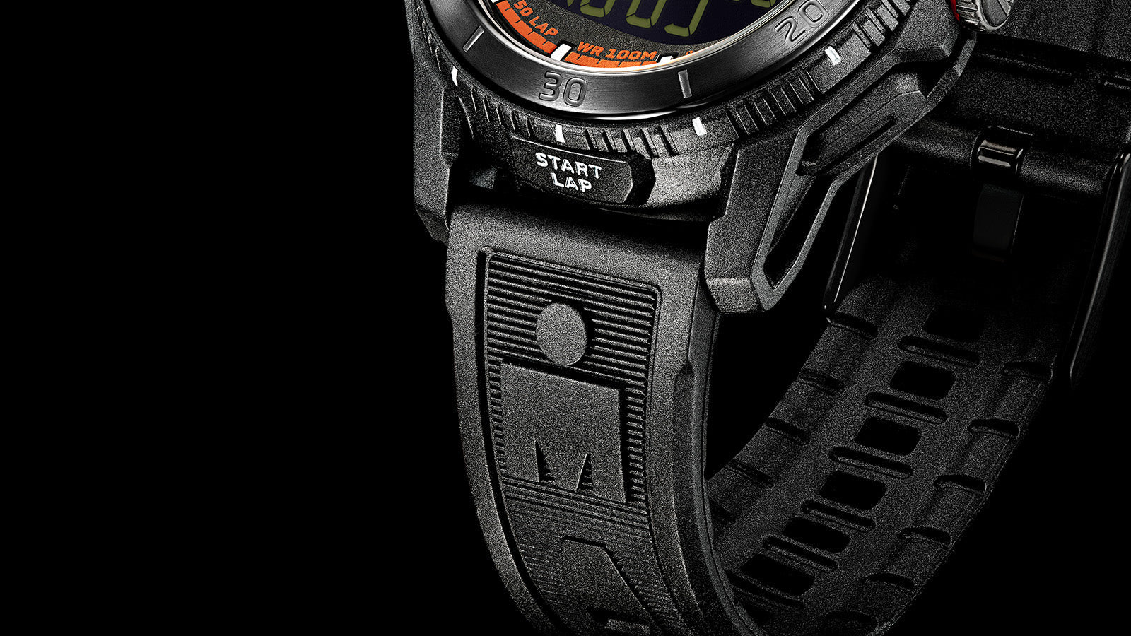 Detailed view of the TIMEX® IRONMAN® Adrenaline Ana-Digi watch strap showing embossed Ironman logo and rugged design texture.