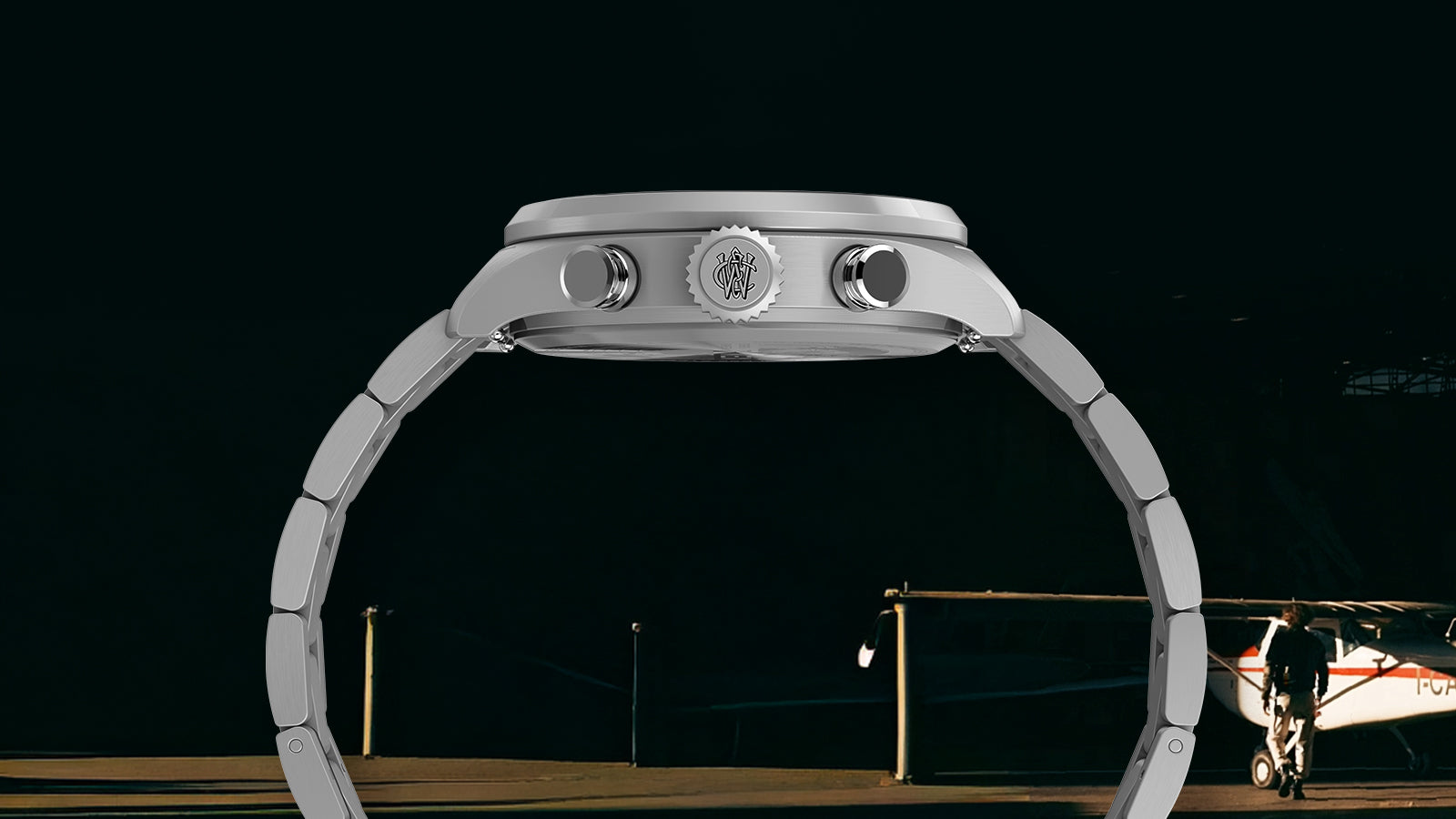Side profile of Timex Waterbury Ace Fly-Back Chronograph showing stainless steel bracelet, case, crown, and pushers