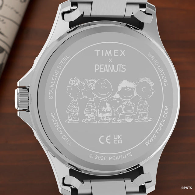 Engraved caseback of Timex x Peanuts watch featuring Snoopy and Peanuts characters with stainless steel finish