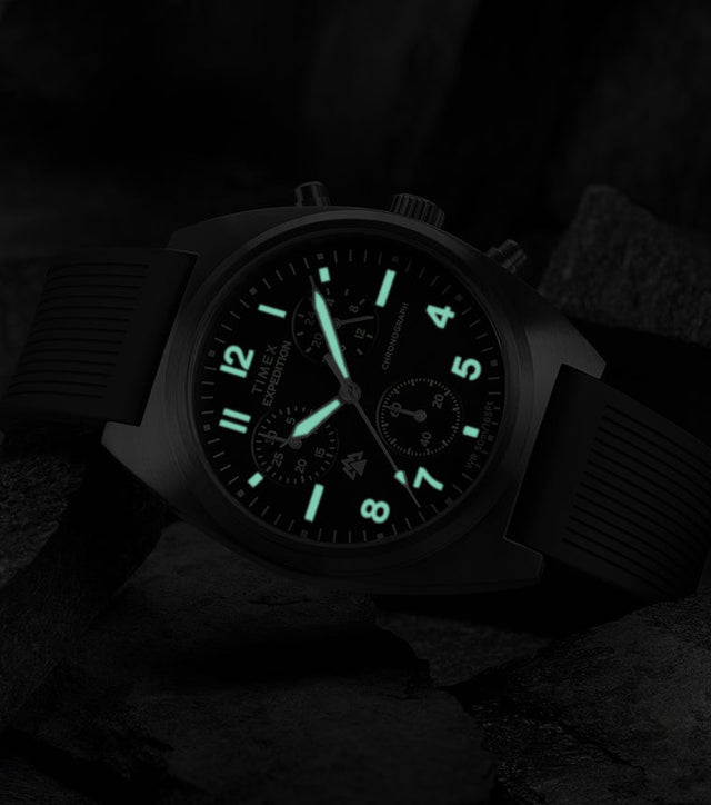 Timex Expedition Capstone Chronograph with glowing lume markers and hands in low light