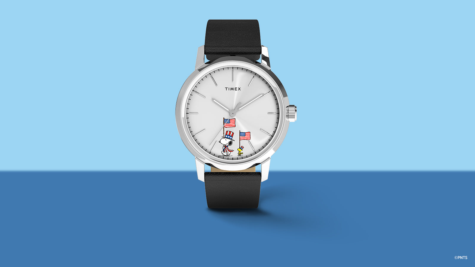 Front view of Timex Marlin Automatic x Peanuts Americana watch with minimalist silver dial and Snoopy and Woodstock design