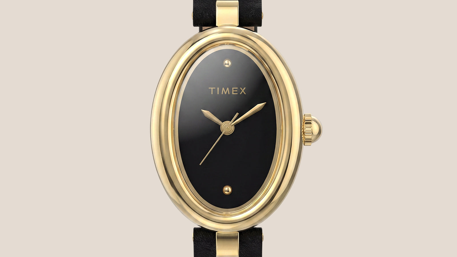 Front view of the Timex Cavatina® Luxe featuring a polished gold-tone oval case, glossy black dial, minimalist gold-tone hands, and black leather strap.