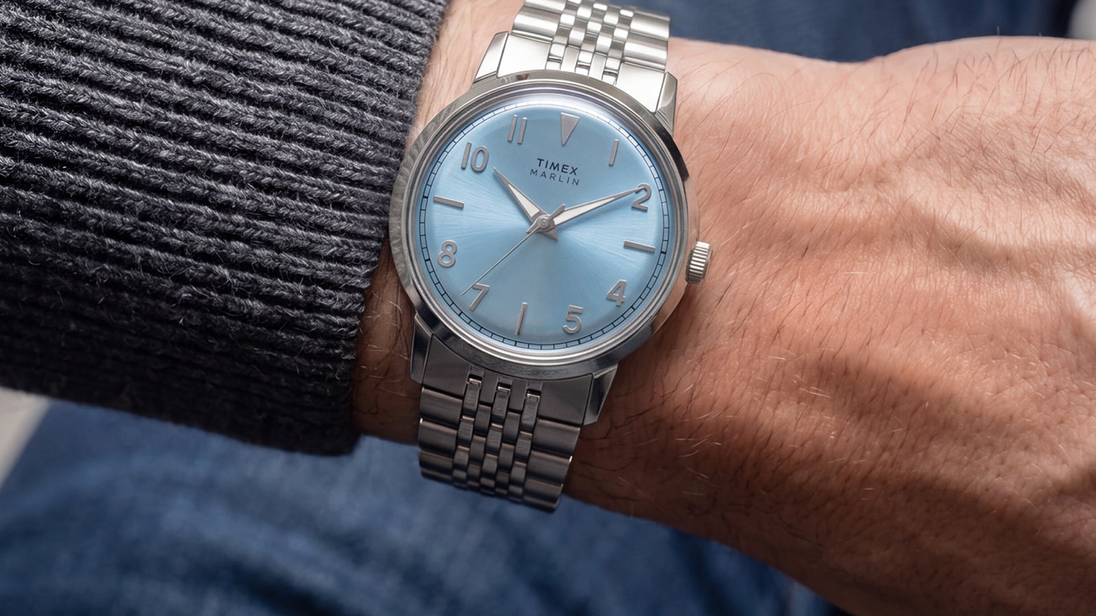 Timex Marlin Quartz with an ice blue sunray dial and stainless steel bracelet worn on the wrist.
