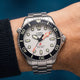 Deepwater Meridian 200 HEV Automatic with a silver-tone dial, black bezel, and stainless-steel bracelet worn on the wrist.
