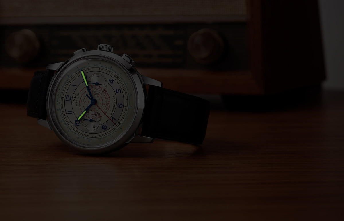 Marlin® Neo Classic Chronograph in low light with green luminous hour and minute hands.