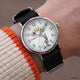 TW2Y99100 Looney Tunes Bugs and Friends x Timex Standard watch worn on a wrist, showing its white character dial, silver-tone case, and black fabric strap.