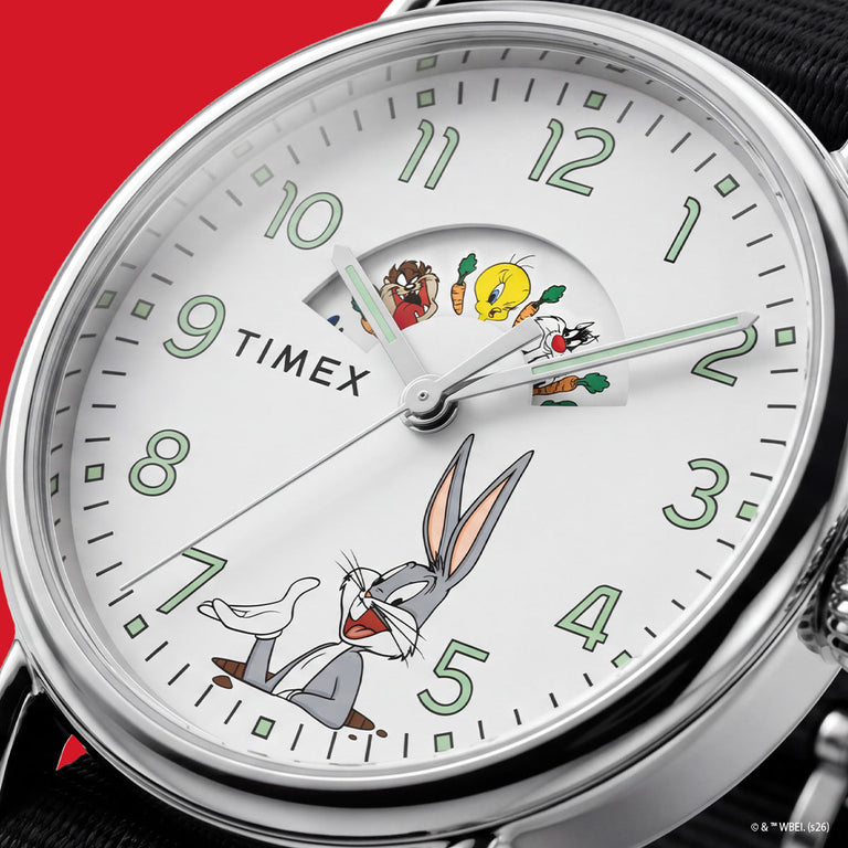 TW2Y99100 Detailed view of the white dial featuring Bugs Bunny below the hands and Taz, Tweety, and Sylvester in a curved character display above.