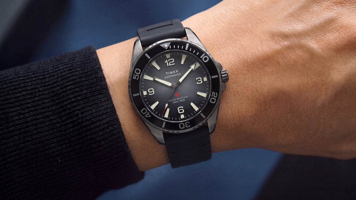 TW3A02000 Gray-dial Deepwater Arctic 200 watch with a black strap worn on the wrist.