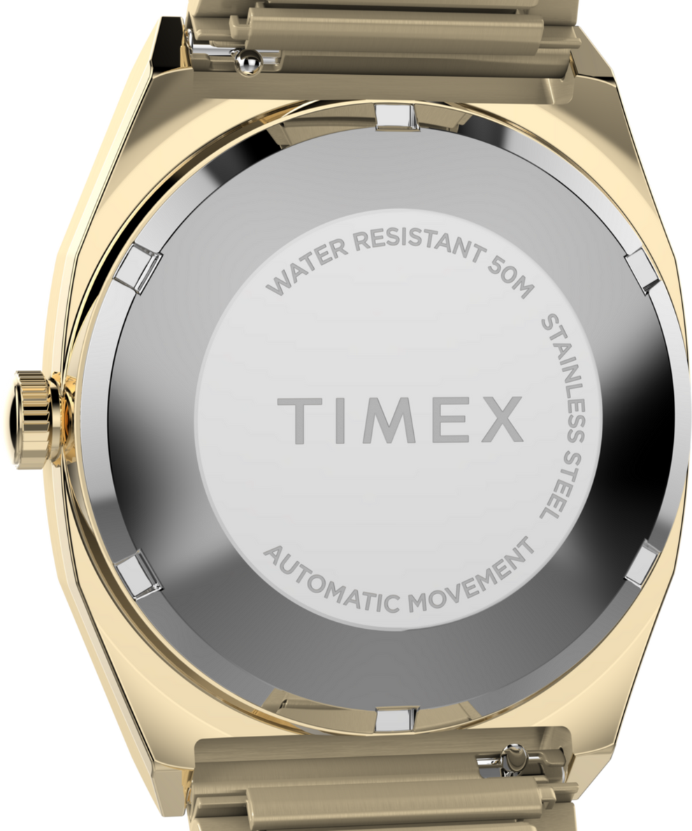 TW2Y07200 Timex® Automatic 1983 E Line 34mm Gold Tone Expansion Band Watch Caseback Image