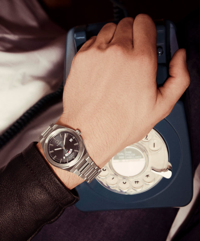 TW2Y12100 Q Timex® Continental GMT 39mm Stainless Steel Bracelet Watch Primary Wrist Image