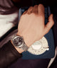 TW2Y12100 Q Timex® Continental GMT 39mm Stainless Steel Bracelet Watch Primary Wrist Image