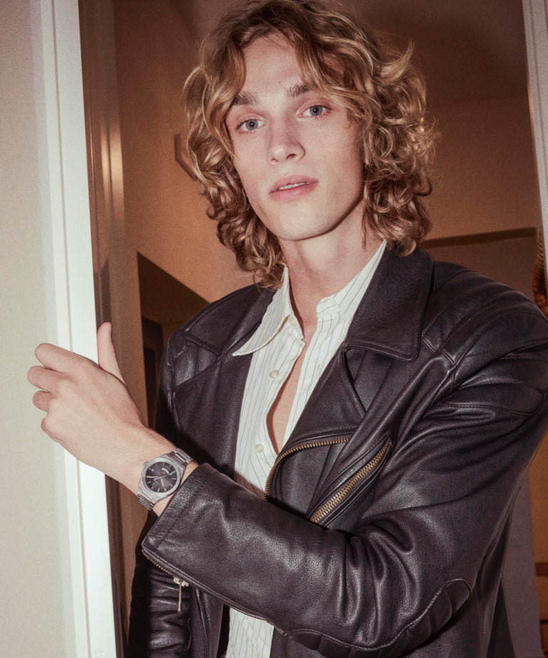 TW2Y12100 Q Timex® Continental GMT 39mm Stainless Steel Bracelet Watch Lifestyle 2 Image