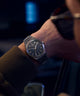 TW2Y25000 Q Timex® Continental Day and Date 39mm Stainless Steel Bracelet Watch Alt Wrist Shot 1 Image