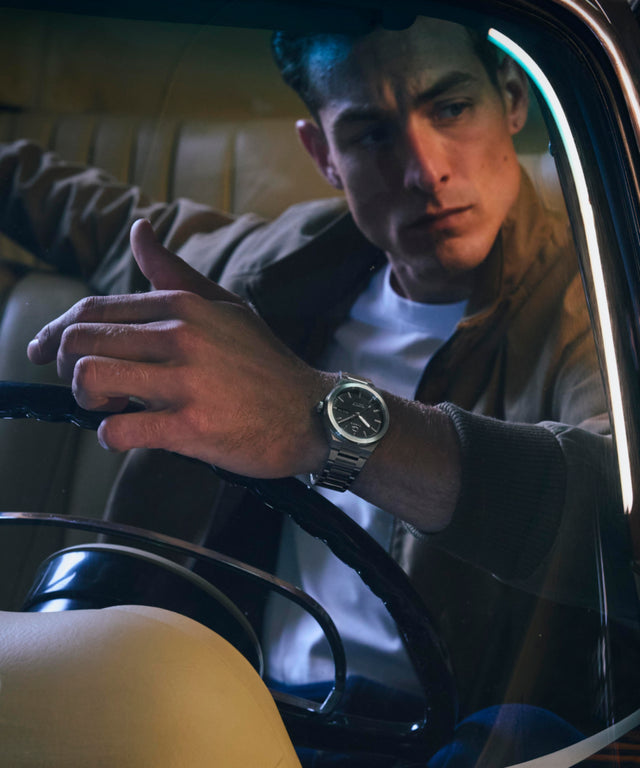 TW2Y25000 Q Timex® Continental Day and Date 39mm Stainless Steel Bracelet Watch Lifestyle 2 Image