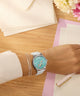 TW2Y68800 Peanuts® x Timex Marlin® Flower Dial 38mm Leather Strap Watch  Primary Wrist Image