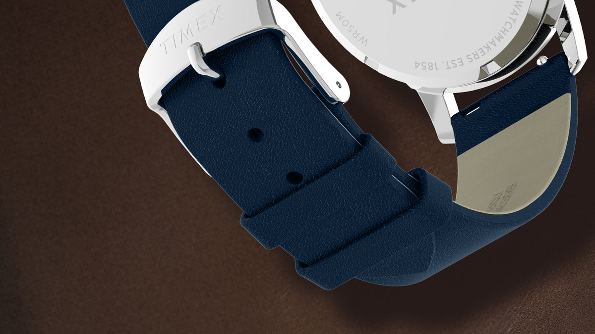 TW2Y73800 Back view of the watch showing its silver-tone case back and navy strap.