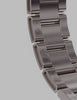 The video appears to showcase close-up shots of a watch bracelet, focusing on the metallic links and their design details