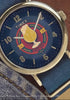 Video showcasing Harry Potter x Timex Weekender Butterbeer watch highlighting Butterbeer dial artwork, gold-tone case, and blue fabric strap.