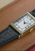 Video showcasing the Timex 1976 Lexington Reissue with rotating close-ups of the gold-tone rectangular case, Roman numeral dial, slim profile, and black leather strap in both lifestyle and product detail views.